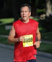 Dr Len running Professional massage therapy